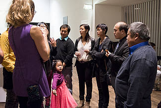 The protagonists of the film, the Vang family, talking to visitors, photo: Sebastian Bolesch