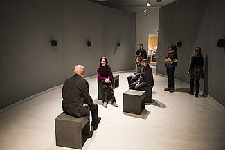 Werner Durand talking to visitors in the exhibition "Music listening", Project "Activated Sounds", photo: Sebastian Bolesch